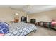 Spacious main bedroom with carpet flooring and an ensuite bathroom for added privacy and comfort at 510 Lobelia Dr, Davenport, FL 33837