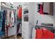 Walk-in closet with ample storage, shelving, and hanging space for organization at 5107 Ne 122Nd Blvd, Oxford, FL 34484