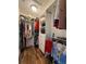 Walk-in closet with custom shelving and organized storage solutions at 5107 Ne 122Nd Blvd, Oxford, FL 34484