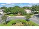 Aerial view of the Brentwood community entrance, showcasing lush landscaping and a welcoming design at 5107 Ne 122Nd Blvd, Oxford, FL 34484