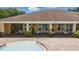 Aerial view of community pool and outdoor seating area, perfect for relaxation and social gatherings at 5107 Ne 122Nd Blvd, Oxford, FL 34484
