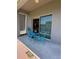 Outdoor patio with painted metal table and chairs at 5107 Ne 122Nd Blvd, Oxford, FL 34484
