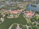 Aerial view highlighting community amenities including pools, recreation center, and lush landscaping at 532 Casanova Ct, Kissimmee, FL 34759
