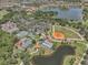 An aerial view of the sports complex with tennis courts, baseball field, and lakes at 532 Casanova Ct, Kissimmee, FL 34759