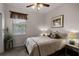 Cozy bedroom with window, ceiling fan, and natural light at 532 Casanova Ct, Kissimmee, FL 34759