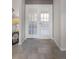 Hallway with a view of the French doors leading to the study at 532 Casanova Ct, Kissimmee, FL 34759