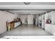 Spacious garage with built-in shelving and ample storage cabinets on a clean, epoxy floor at 532 Casanova Ct, Kissimmee, FL 34759