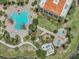 Aerial view of a community pool, sun deck, and well-maintained landscaping at 532 Casanova Ct, Kissimmee, FL 34759