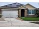 Charming single Gathering home featuring solar panels, attached two car garage, and tidy lawn at 5367 Douglas Fir Dr, St Cloud, FL 34771