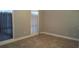 An empty bedroom featuring neutral colors, tile floors and bright windows at 5418 Brookswood Way # 100 Brookwood Way # 1008, Orlando, FL 32808