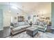 Spacious living room area featuring vaulted ceiling and hardwood flooring at 544 Remington Oak Dr, Lake Mary, FL 32746