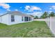 Fenced backyard with screened in lanai at 560 Viceroy Ct, Kissimmee, FL 34758