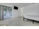 Spacious bedroom with tile flooring and private lanai at 560 Viceroy Ct, Kissimmee, FL 34758