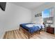 Bedroom with a plush comforter and natural light at 560 Viceroy Ct, Kissimmee, FL 34758