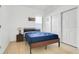 Bedroom featuring neutral walls, closet space, and natural light at 560 Viceroy Ct, Kissimmee, FL 34758