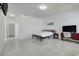 Bedroom with tile flooring, work space, and overhead lighting at 560 Viceroy Ct, Kissimmee, FL 34758