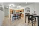 Eat-in kitchen, with breakfast bar and seamless flow into the dining room for easy entertaining at 560 Viceroy Ct, Kissimmee, FL 34758