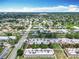 Wide aerial view of residential area, roads, and apartment buildings at 744 Wyman Ct # 744, Orlando, FL 32809