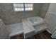 Bathroom featuring a whirlpool tub and a glass shower at 7507 Sandstone Dr, Orlando, FL 32836