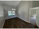 Bright dining area featuring modern floors, chandelier lighting and a view of the backyard pool area at 7507 Sandstone Dr, Orlando, FL 32836