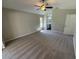 Carpeted main bedroom with ample natural light at 7507 Sandstone Dr, Orlando, FL 32836