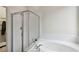 Bathroom with a shower stall and soaking tub at 7551 Bear Claw Run, Orlando, FL 32825