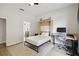 Bedroom featuring a murphy bed with an attached desk, and luxury vinyl plank flooring at 7551 Bear Claw Run, Orlando, FL 32825