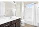 Bathroom featuring modern vanity and shower-tub combo at 7710 Linkside Loop, Reunion, FL 34747