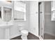 Bathroom featuring stand alone sink, toilet, and stand up shower at 7710 Linkside Loop, Reunion, FL 34747