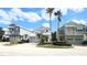 Charming two-story home with a two-car garage, and well-maintained landscaping in a vibrant neighborhood at 7710 Linkside Loop, Reunion, FL 34747