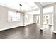 Bright living room with large windows, recessed lighting, and tile flooring at 7710 Linkside Loop, Reunion, FL 34747