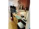 Compact kitchen with appliances, cabinetry, and countertops at 7900 S Orange Blossom Trail # 2041, Orlando, FL 32809
