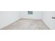 A bright room with a window and neutral carpet at 809 Benoi Dr, Davenport, FL 33896