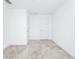 A bright room with two doors and neutral carpet at 809 Benoi Dr, Davenport, FL 33896