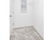 Bright walk-in closet with carpet, shelving and a window for natural light at 809 Benoi Dr, Davenport, FL 33896