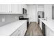 Bright kitchen featuring a gas range, stainless appliances, light countertops and backsplash at 809 Benoi Dr, Davenport, FL 33896