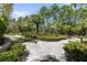Beautiful putting green features manicured fairways amidst lush greenery, perfect for Gathering fun at 809 Benoi Dr, Davenport, FL 33896