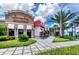 Charming storefronts feature well-maintained landscaping and a welcoming atmosphere for shoppers and residents alike at 809 Benoi Dr, Davenport, FL 33896