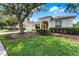 Lovely single-story home with manicured lawn, mature trees, and a two-car garage in a serene setting at 821 Shallow Brook Ave, Winter Springs, FL 32708