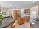 Bright kitchen with stainless steel appliances and a center island with granite countertop at 821 Shallow Brook Ave, Winter Springs, FL 32708