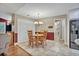 Dining room with tile floors and chandelier lighting at 828 Timber Court Ct, Apopka, FL 32712