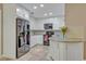 Stylish kitchen with white cabinets, stainless steel appliances, and granite countertops at 828 Timber Court Ct, Apopka, FL 32712