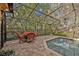 A relaxing outdoor space with a pool and patio area, perfect for entertaining guests at 828 Timber Court Ct, Apopka, FL 32712