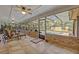 Screened in porch with views to the pool and backyard at 828 Timber Court Ct, Apopka, FL 32712
