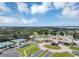 High angle of clubhouse and community amenities including pool, tennis courts and parking at 8430 Woburn Ct, Windermere, FL 34786