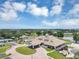 Overhead view of the clubhouse and manicured landscaping at 8430 Woburn Ct, Windermere, FL 34786