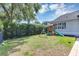 A well-maintained backyard with a swing set and play area, ideal for Gathering fun at 8430 Woburn Ct, Windermere, FL 34786