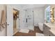 This bathroom features a glass shower, soaking tub, and walk-in closet at 8430 Woburn Ct, Windermere, FL 34786