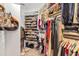Walk-in closet offering abundant storage and organization solutions for clothing and accessories at 8430 Woburn Ct, Windermere, FL 34786