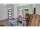 Cozy living area with comfortable chairs and lots of light at 8430 Woburn Ct, Windermere, FL 34786